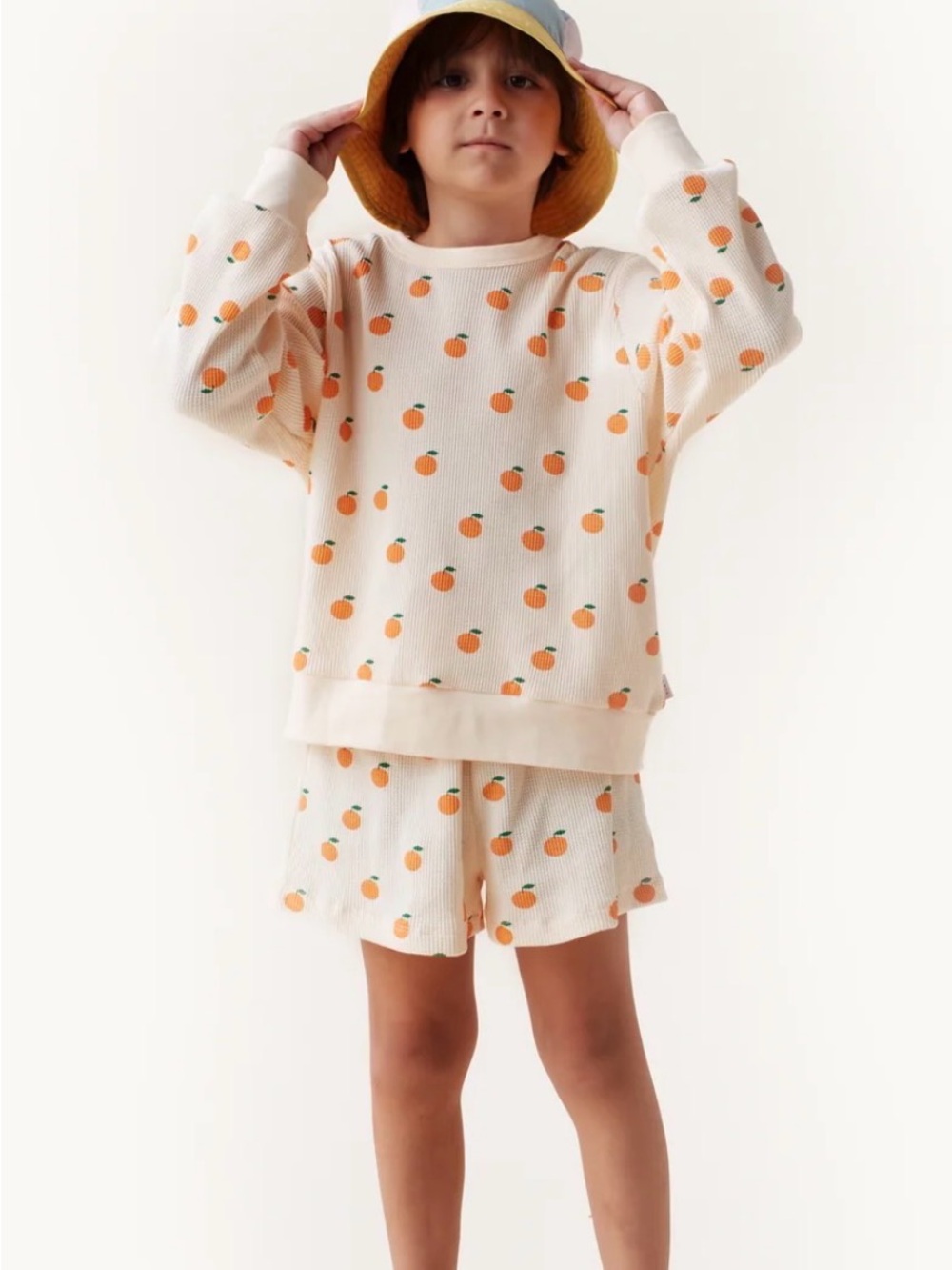 Cream Waffle-Knit Athletic Shorts with Orange Print by Tinycottons
